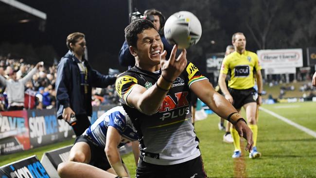 Dallin Watene-Zelezniak celebrates after a scoring a try against the Canterbury-Bankstown Bulldogs. Picture: David Moir