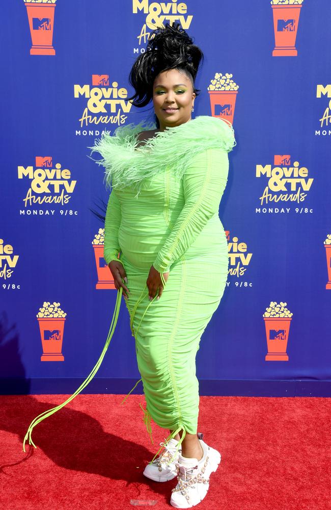 Blame it on the juice! Lizzo … and her sneakers. Picture: Getty Images for MTV