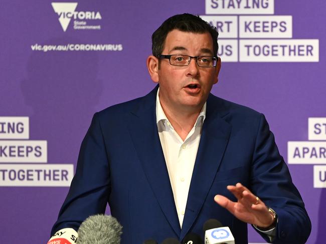 MELBOURNE, AUSTRALIA - MAY 11: Victorian premier Daniel Andrews speaks to the media on May 11, 2020 in Melbourne, Australia. Premier Daniel Andrews has announced some easing of COVID-19 restrictions for Victorians in response to Australia's declining coronavirus (COVID-19) infection rate. From 11:59pm on Tuesday 12 May, people in Victoria will be allowed to visit friends and family. A maximum gathering of up to ten outdoors is allowed, or up to five visitors inside a home. (Photo by Quinn Rooney/Getty Images)