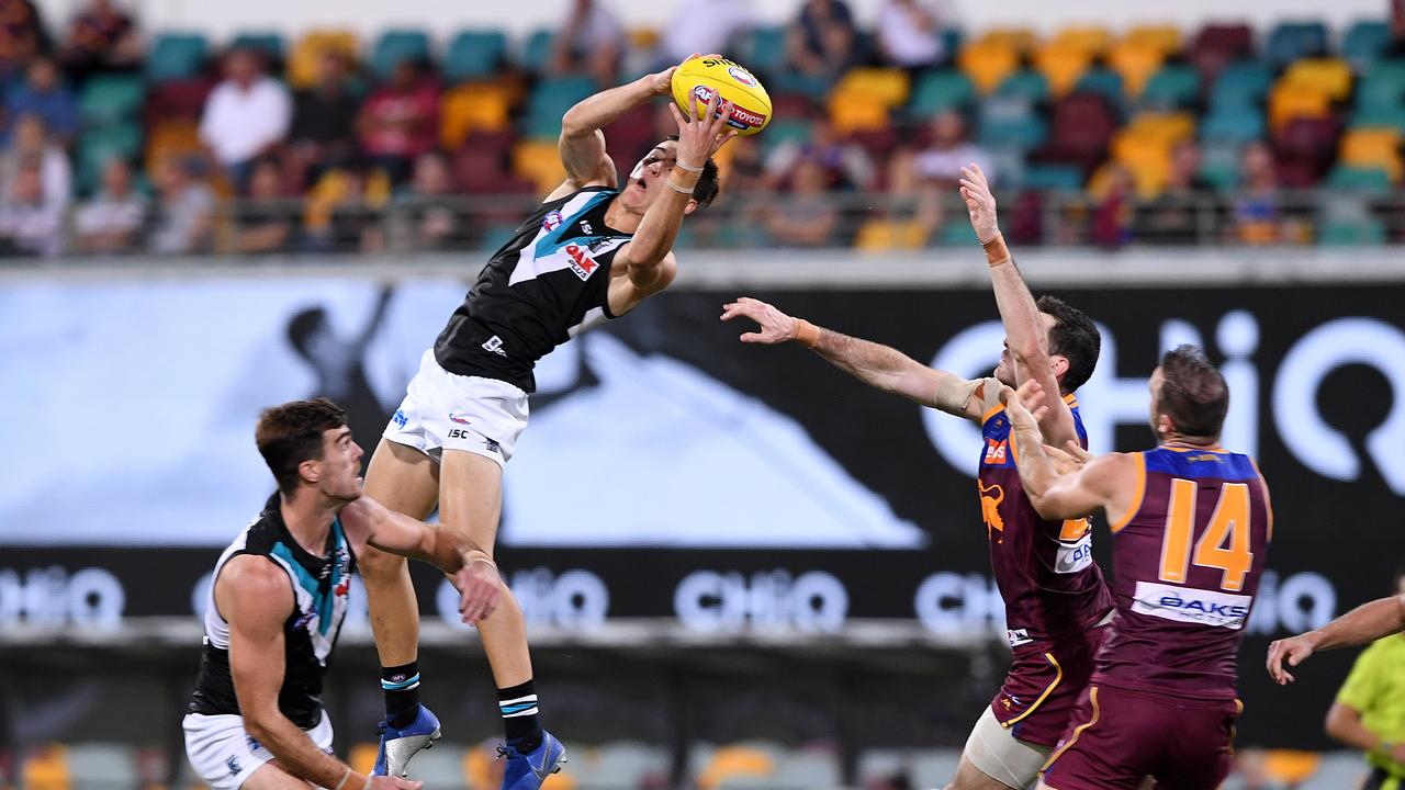 Connor Rozee flies up forward against the Brisbane Lions on Saturday. Picture: AAP Image/Dave Hunt