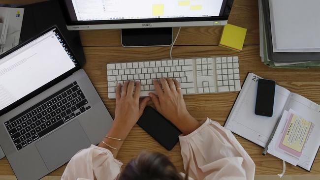 Not all work is ­easier in the office, but it’s been fun to reclaim the dining room table. Picture: Bloomberg