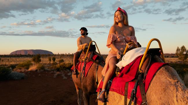 Tourists from across Australia will be able to secure half-priced airfares to Uluru, where Pyndal Camel Tracks is located. Picture: Tourism NT/Matt Cherubino