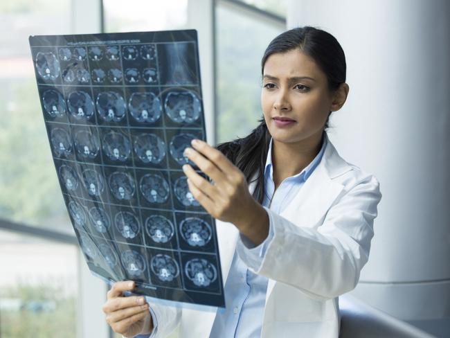 Generic photo in hospital - doctor looking at an xray (x-ray). Picture: iStock