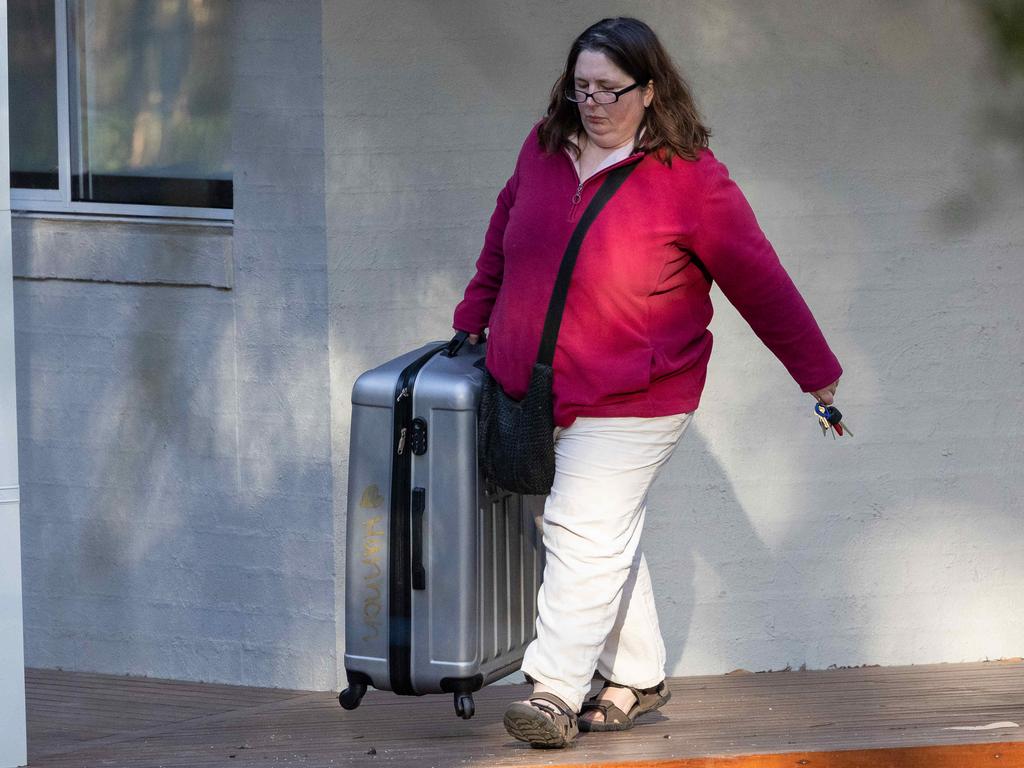 Erin Patterson leaves her Leongatha home with a suitcase. Picture: Jason Edwards