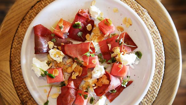 The Lemonade compressed watermelon with goats cheese, and spiced air dried beef bastruma at Maestro & Co dining in Manly. Picture: Braden Fastier