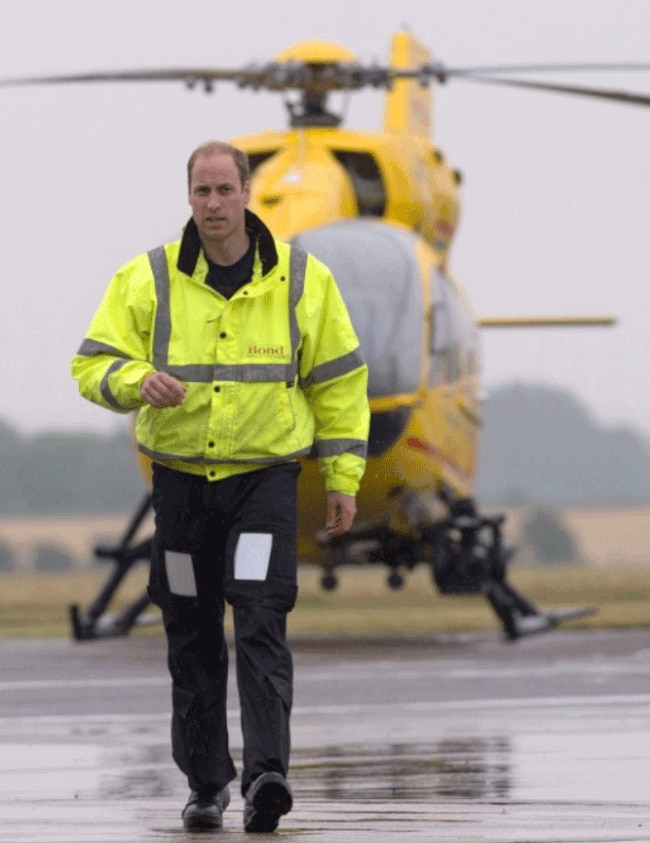 Britain's Prince William, The Duke of Cambridge walks on the runway when he began his job with the East Anglian Air Ambulance (EAAA) at Cambridge Airport on July 13, 2015. Picture: AFP