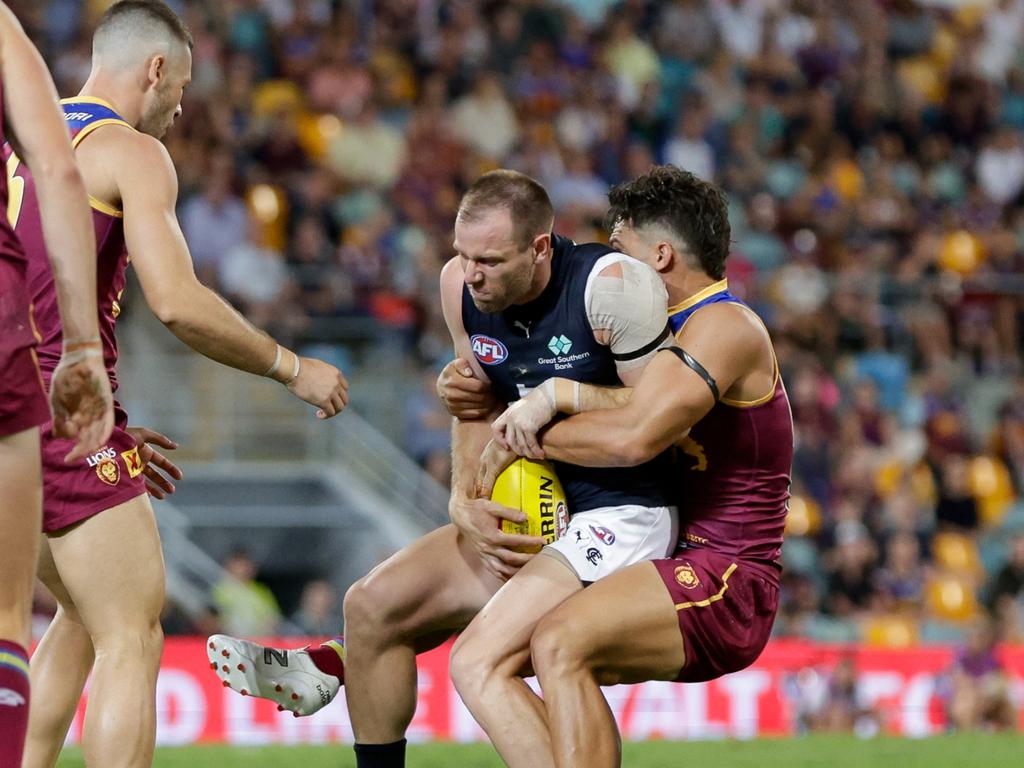 Sam Docherty is tackled against the Lions. Picture: Russell Freeman/AFL Photos via Getty Images