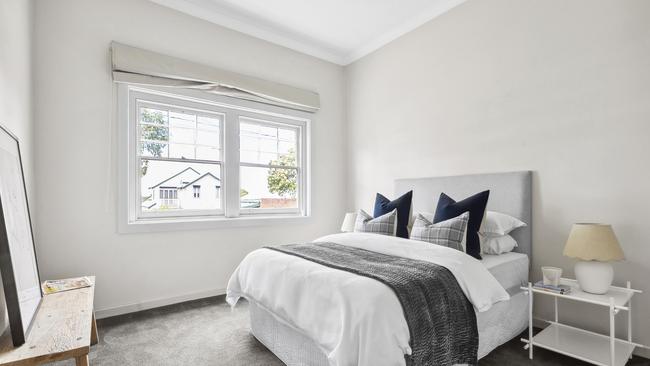 Leadlight windows feature main bedroom.