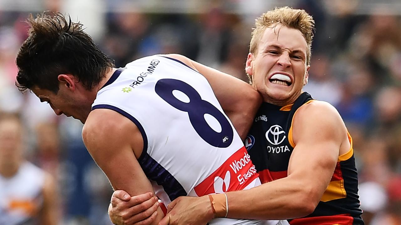 Jordan Dawson lays a tackle on Andy Brayshaw. Picture: Getty Images