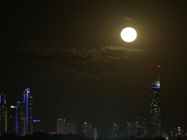 A spectacular full moon over Surfers Paradise last night. Photo: Glenn Hampson