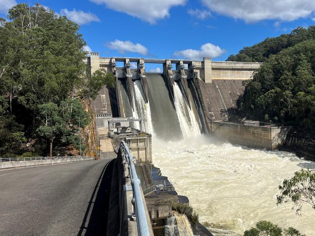WARRANGAMBA, AUSTRALIA. APRIL 6, 2024 Warragamba Dam spill gates opened. , Following heavy rainfall overnight at the upper end of the forecasts (the 25% chance), Warragamba Dam reached full capacity and started spilling at 5:45am., The Warragamba catchment received a significant amount of rain from midnight at an average of 100 mm over 6 hours, with the sub-catchment, close to the dam wall, receiving ~130mm. Up to 200mm was received over 24 hours in some areas., This created flash flooding in the catchment and into the dam, causing it to spill., Warragamba Dam is spilling at a rate of around 200 gigalitres per day (GL/day) with that rate continuing to rise., With the flooding in the Hawkesbury-Nepean Valley the spill will contribute to the flood waters already in the system. Picture: Via NCA NewsWire.