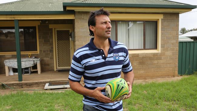 Raiders legend Laurie Daley in front of his second childhood home in Junee.