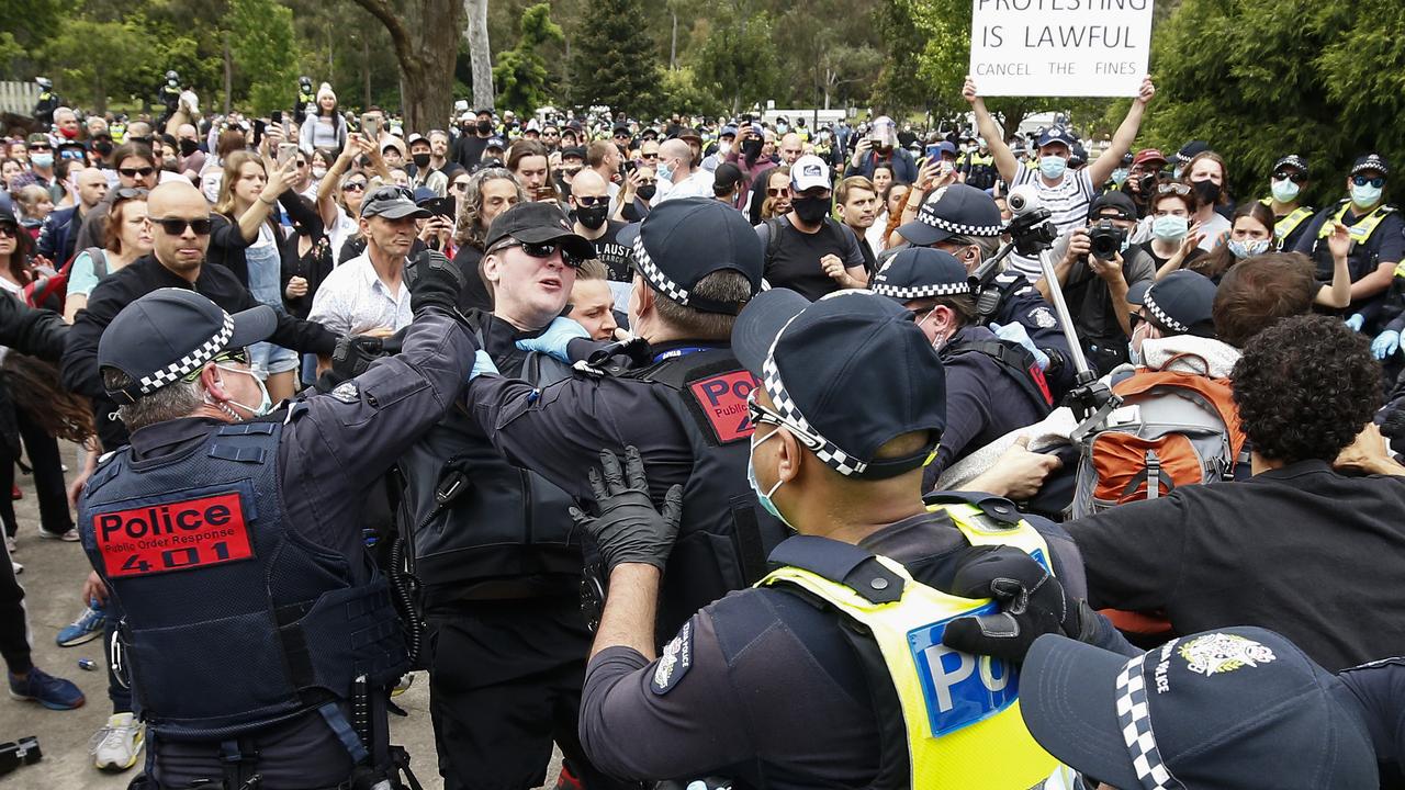 Protesters clash with police at an anti-lockdown protest at the Shrine of Remembrance in Melbourne, Victoria. Picture: NCA NewsWire / Daniel Pockett