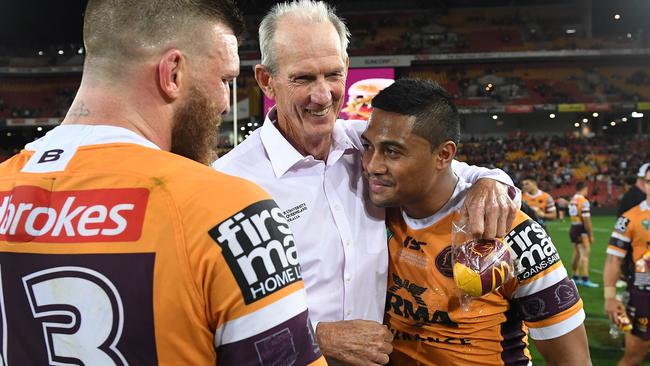 Wayne Bennett embraces Anthony Milford during their time at the Broncos (AAP Image/Dave Hunt)