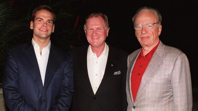 Ken Cowley, centre, pictured in 1997 with Lachlan and Rupert Murdoch