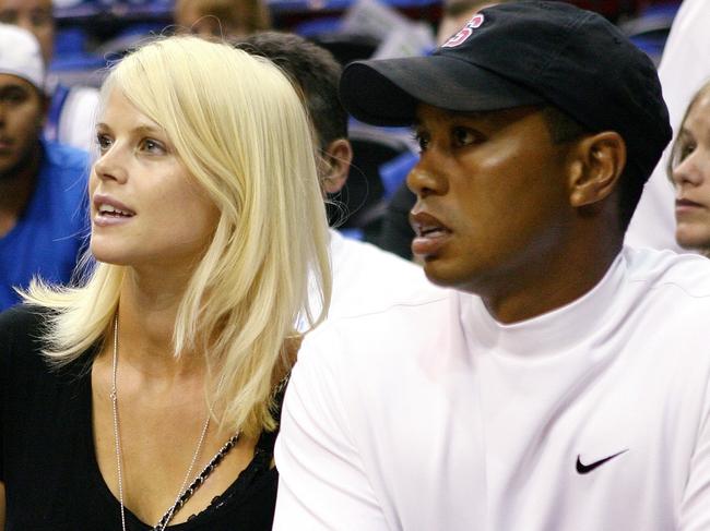 ORLANDO, FL - JUNE 11: Golfer Tiger Woods sits courtside with his wife Elin during Game Four of the 2009 NBA Finals between the Los Angeles Lakers and the Orlando Magic at Amway Arena on June 11, 2009 in Orlando, Florida. The Lakers won 99-91 in overtime and lead the series 3-1. NOTE TO USER: User expressly acknowledges and agrees that, by downloading and or using this photograph, User is consenting to the terms and conditions of the Getty Images License Agreement. (Photo by Elsa/Getty Images)