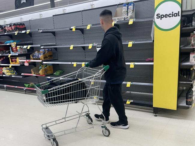 MELBOURNE, AUSTRALIA- NewsWire Photos DECEMBER 3, 2024: Woolworth workers continue a picket line at the Dandenong South Distribution centre. Pics if shelves in Woolworths with limited stock. Picture:  NewsWire