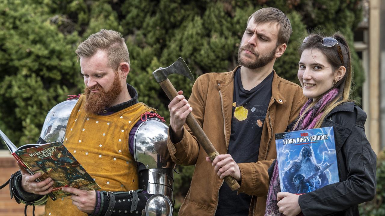 Ben Norman from Tyr's Warriors with Thomas Murphy and Katie Hennig from USQ’s Dungeons and Dragons. Picture: Nev Madsen.