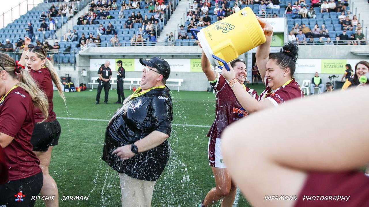 Kawana women’s head coach Geoff Wheeler is showered with water after the 2023 grand final. Picture: Richo Jarman