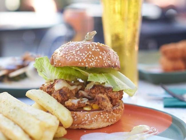 Untied, a modern Australian themed rooftop bar, is serving a jerk chicken burger. Picture: Facebook