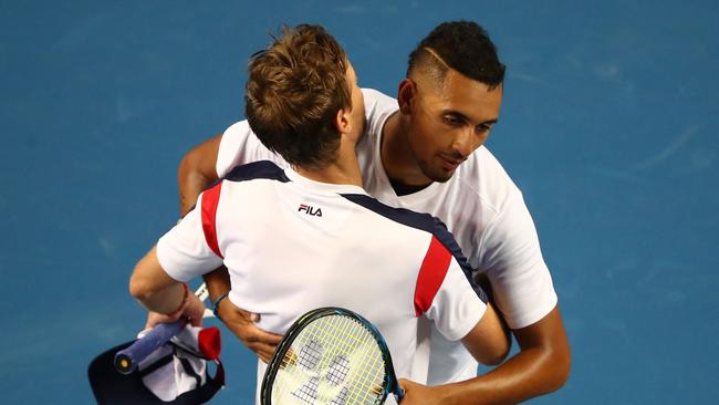 Nick Kyrgios congratulates Andreas Seppi after their memorable second round match. Picture: Getty Images