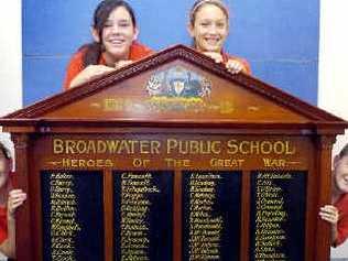 Heroes honoured: Proudly displaying the refurbished World War I honour board are Broadwater Public School students (from left) Sally Cattle, Kaitlyn Patterson, Kelly Wilson and Connor O’Rourke. . Picture: Cathy Adams