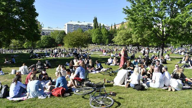 People enjoy the sunny weather in Tantolunden Park in Stockholm on May 30. Picture: Henrik Montgomery/TT News Agency/AFP