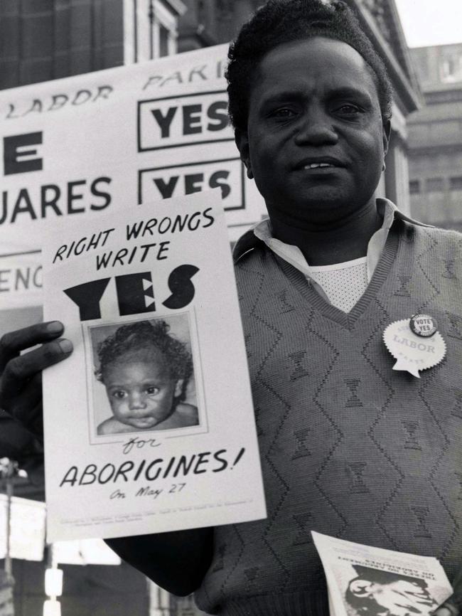 Roy Fletcher, an Aboriginal from Cape York Peninsula, hands out How to Vote cards in 1967.