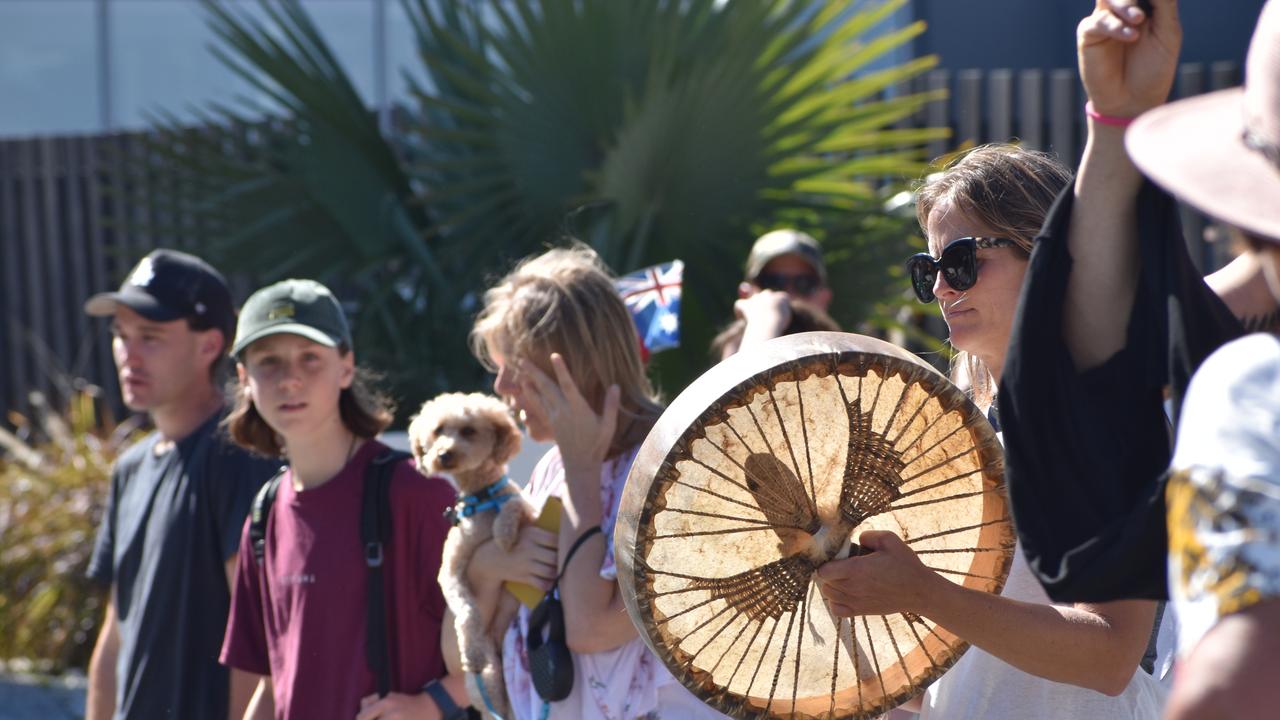 Protester with a drum. Photo: Liana Walker