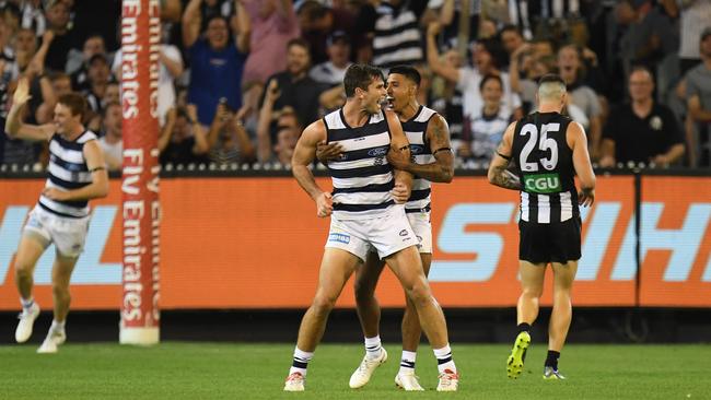 Tom Hawkins and Tim Kelly helped Geelong to a seven-point win against Collingwood at the MCG in Round 1.