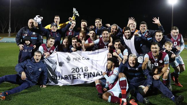 APIA Leichhardt players celebrate their FFA Cup win over Melbourne Victory. Picture: Getty Images