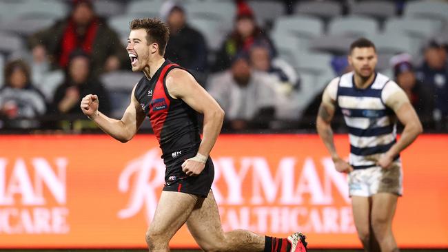 AFL Round 16. Geelong vs Essendon at GMHBA Stadium. 02/07/2021. Zach Merrett of the Bombers celebrates a goal during the 3rd qtr. . Pic: Michael Klein