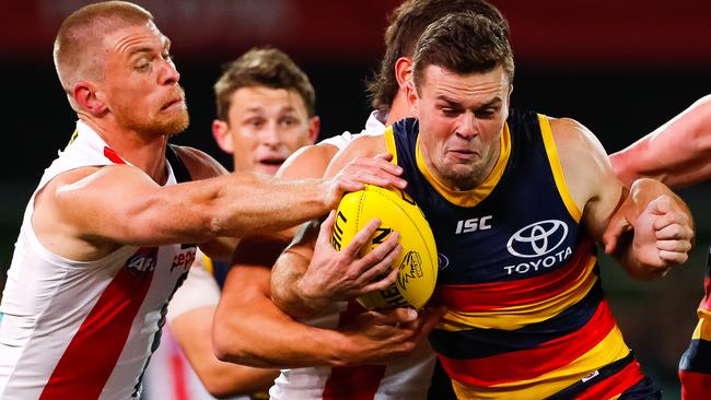 Brad Crouch tries to evade tackles against St Kilda in Round 7.