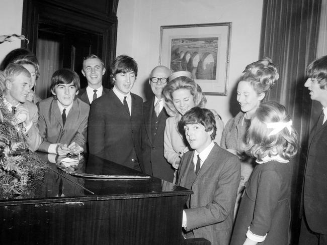 Paul McCartney playing the piano at the Melbourne Town Hall during a state reception. Picture: Herald Sun Image Library