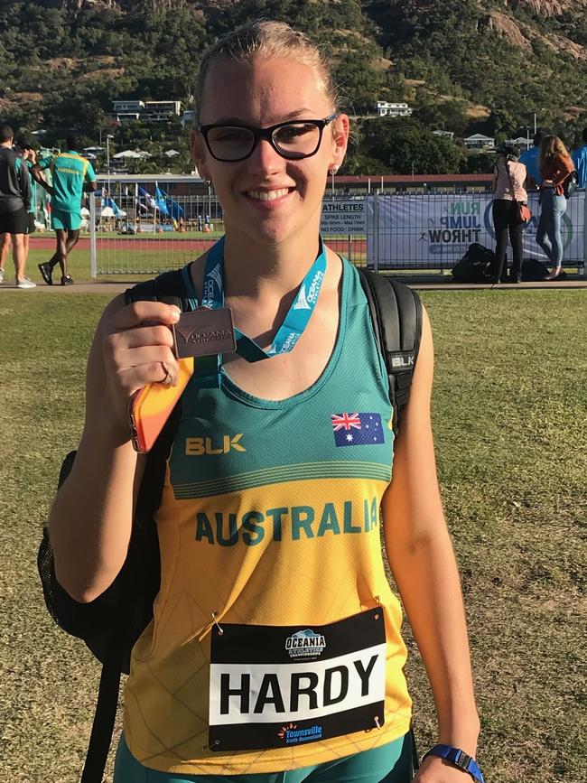 Renee with her bronze medal from the 2019 Oceania Athletics Championships.