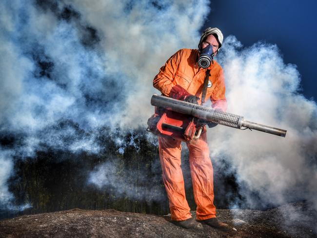 Bruce Summerfield attacks mosquitoes with a fogging machine. Picture: Tony Gough