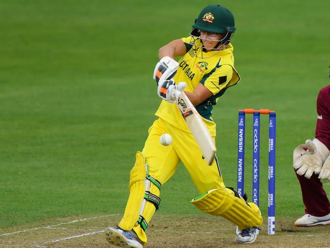 Australia batsman Nicole Bolton pulls a ball to the boundary watched by wicketkeeper Merissa Aguilleira during the ICC match between Australia and West Indies.