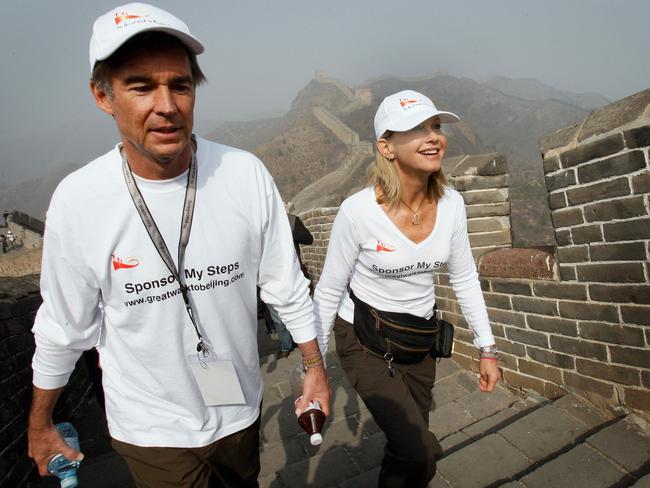 Olivia Newton-John walking with businessman John Easterling during their Great Walk to Beijing. Picture: News Limited