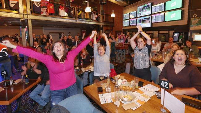 Thunderbirds fans celebrate their team’s heart-stopping victory.