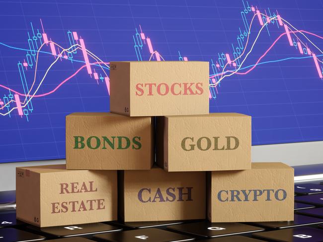 Carton boxes labelled as different investment product categories on a laptop showing stock candle diagram. Illustration of well-diversified portfolios and the importance of asset diversification.