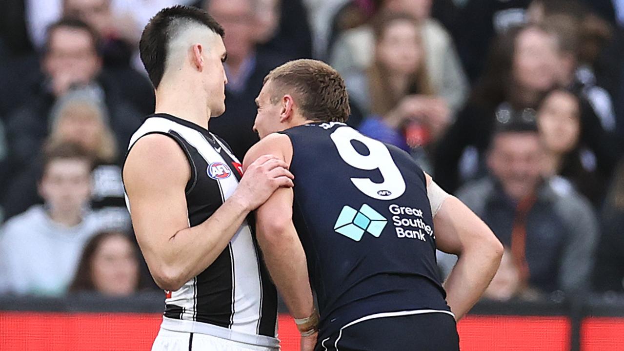 Brayden Maynard checks on the health of Patrick Cripps after a heavy hit. Picture: Michael Klein