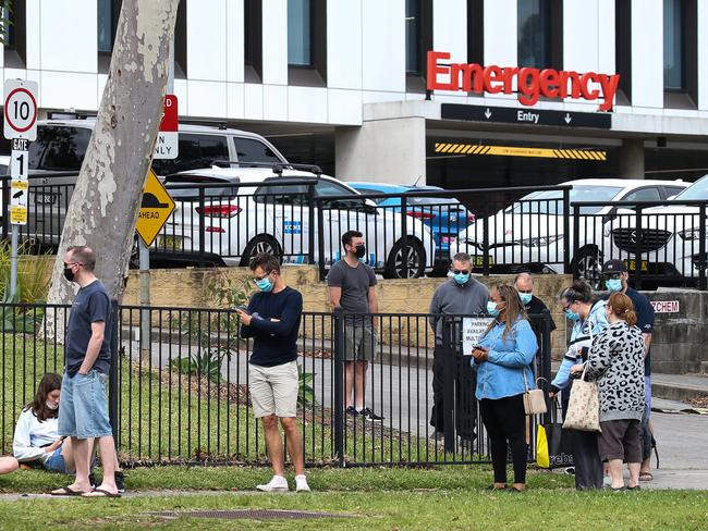 People wait to get tested in Sydney on Monday. Photo: NCA NewsWire / Gaye Gerard