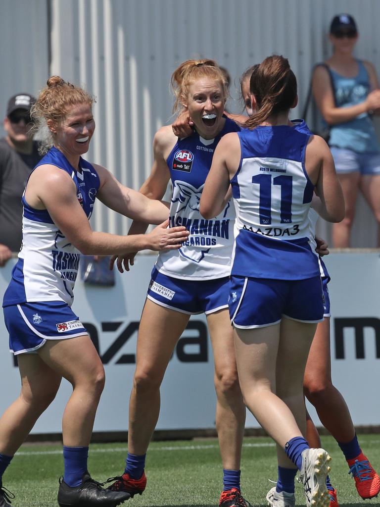 AFLW: North Melbourne vs Carlton, North Hobart Oval: North Melbourne's Alison Drennan (centre) celebrates a goal. Picture: LUKE BOWDEN