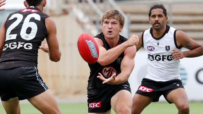 Wines says considerable growth in Port Adelaide’s midfield strength has him upbeat.