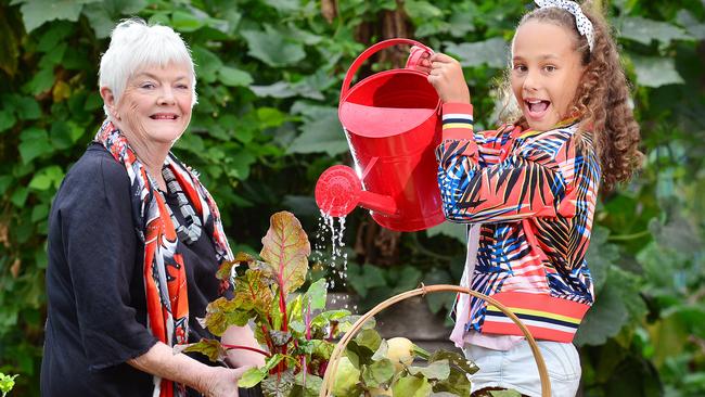 Stephanie Alexander with student Aissa Reddington, 11, in the school's lush veggie garden. This is in support for the Stephanie Alexander Kitchen Garden Foundation program which is leading the way in pleasurable food education at 1900 schools across Australia. Picture: Nicki Connolly