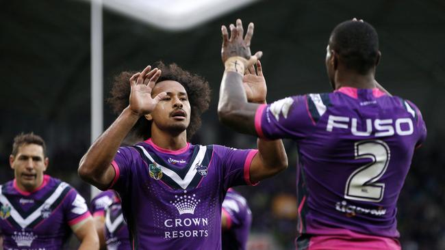 Suliasi Vunivalu celebrates with Storm teammate Felise Kaufusi after scoring a try. Picture: AAP