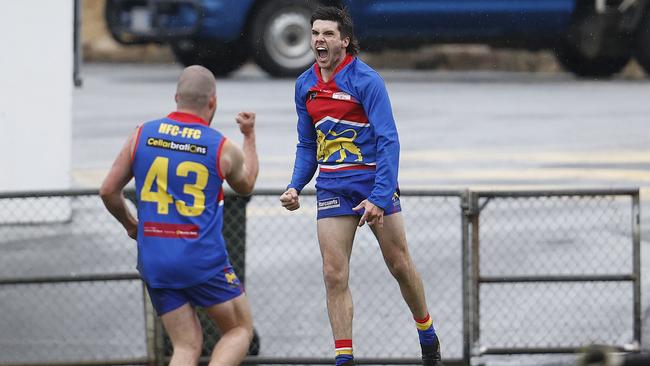 Huonville's Ethan Brock celebrates after kicking a goal. Picture: Zak Simmonds