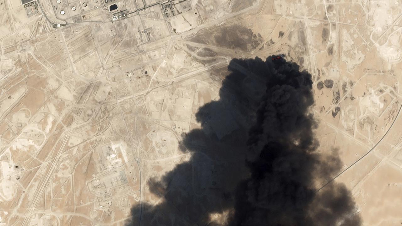 Thick black smoke rising from Saudi Aramco's Abqaiq oil processing facility in Buqayq.