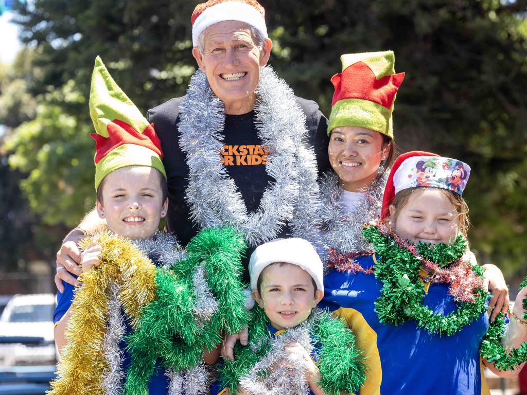 Students Tiffany 7, Kain 7 and Reubin 11, KickStart For Kids’ Ian Steel and Zandra Martin. The charity has received a $20,000 grant. Picture: Kelly Barnes