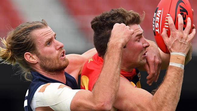 Star for SA and South ... Brett Eddy takes a strong grab in front of Victoria's Peter Faulks. Picture: Tom Huntley